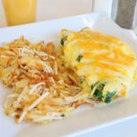 Veggie Omelette · 3 egg omlette with spinach, mushrooms, peppers, onions topped with Swiss, and cheddar cheese...