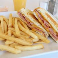 Big Grilled Ham and Cheese · Big grilled cheese with options of white or wheat bread and 4 slices of cheddar cheese and 5...