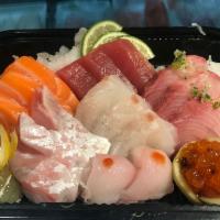 Sashimi Deluxe · Chef choice of : 18 pieces of assorted sashimi.