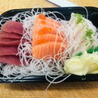 Tri-Color Sashimi Combo · 5 pieces tuna, 5 pieces salmon, 5 pieces yellowtail