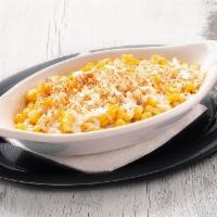 Elote · Hand-cut roasted corn with sour cream, parmesan cheese, cotija cheese, valentina sauce y chi...
