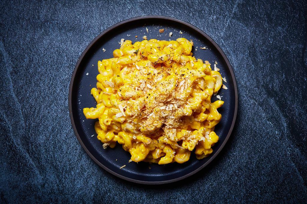 Mac and Cheese · Macaroni prepared with freshly made cheese sauce and bread crumbs.