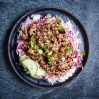 Bulgogi Rice Bowl · Thinly sliced marinated beef with pickled cucumbers, cabbage, sesame seeds, and rice