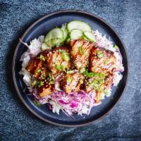 Original Pork Belly Bowl · Thinly sliced decadent braised pork belly with pickled cucumbers, cabbage, sesame seeds, and...