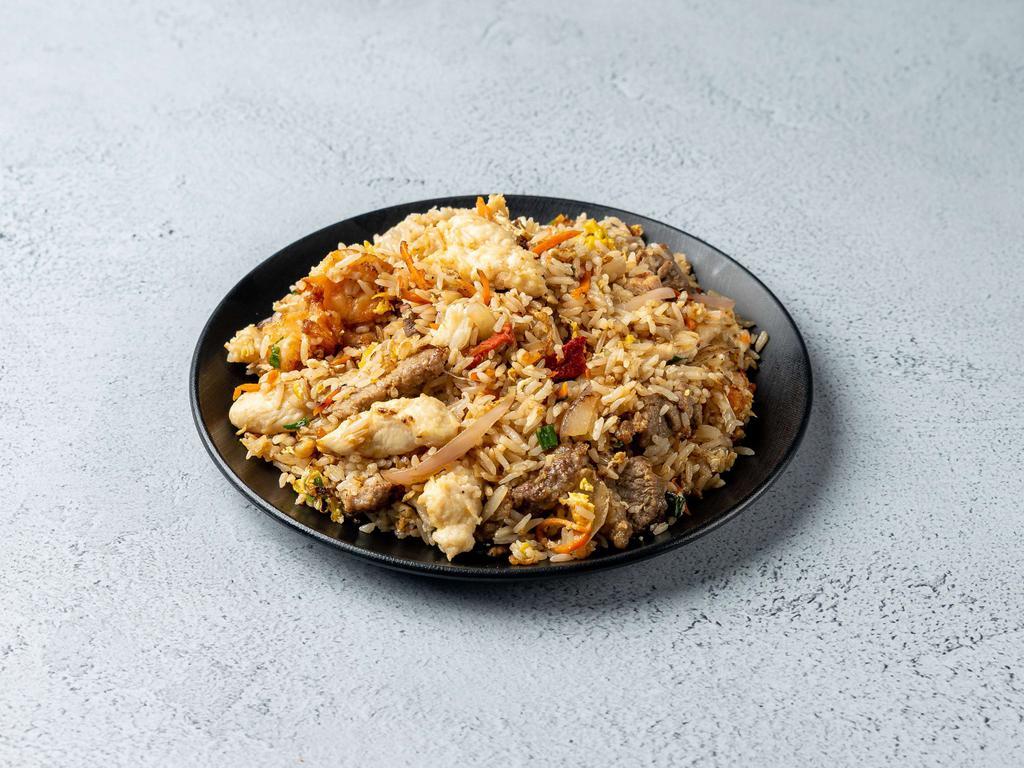 Springs Fried Rice · Stir-fried rice blended with eggs, savory soy sauce, bean sprouts, onions and scallions.