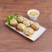 Stuffed Mushrooms · 6 pieces. Fresh button mushroom, stuffed with spinach, Italian sausage, Parmesan cheese and ...