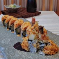 SHINJUKU ROLL · Shrimp Tempura, cucumber, inside topped with spicy snow crab and eel sauce on top.