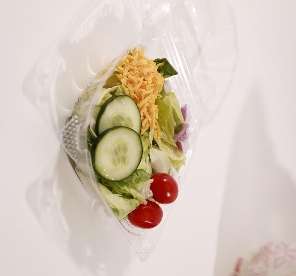 Garden Salad · Lettuce, tomato, cucumber, red onion, cheddar cheese and dressing