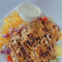 Grilled Chicken Salad · Grilled breast chicken, lettuce, tomato, cucumber, red onion, boiled egg, bacon bits. Served...
