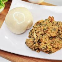 Egusi Soup with Pounded Yam · Fresh egusi soup infused with a variety of West African Seasonings complete with a side of P...