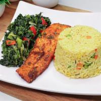 Grilled Salmon with Fried Rice &v Cabbage · Grilled succulent salmon with a side of freshly made cabbage and fried rice slow cooked to p...