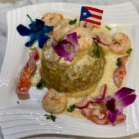Camarones Tainos Dinner · Tainos shrimp. Sauteed shrimp in a creamy white garlic sauce, mofongo or trifongo, and a sma...