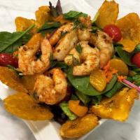 Camaron a la Parilla Picante Salad · Grilled spicy shrimp, mixed greens, cherry tomatoes, clementine, carrots, and red onions, wi...
