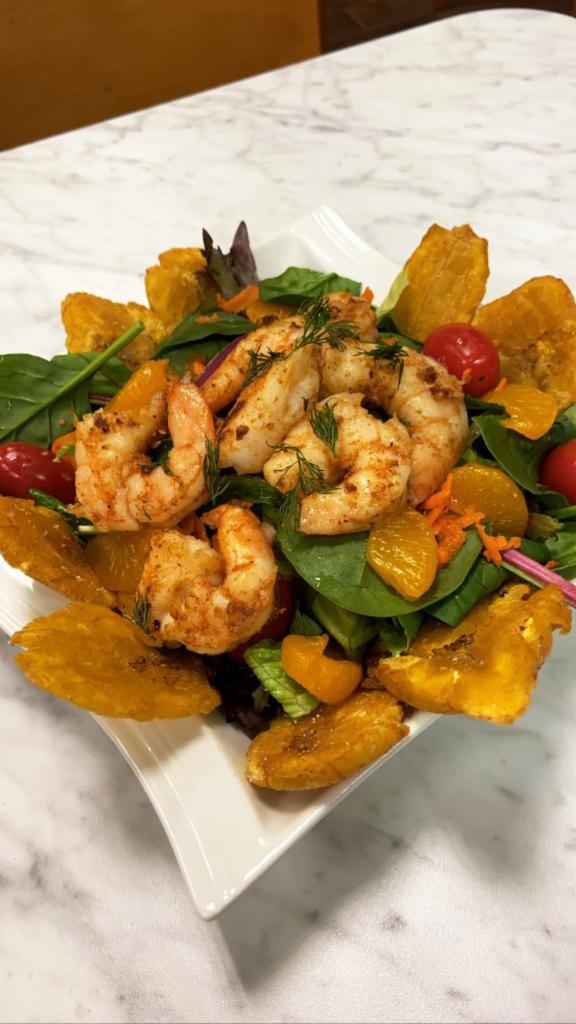 Camaron a la Parilla Picante Salad · Grilled spicy shrimp, mixed greens, cherry tomatoes, clementine, carrots, and red onions, with mojito lime dressing. 