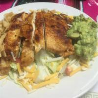 Fiesta Salad · Lettuce, black beans, guacamole, cheese, pico de gallo, corn and crispy tortilla strips with...