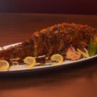 Crispy Fried Red Snapper Fish · Deep fried whole red snapper with choice of different  curry sauces.
