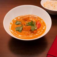 Chicken Tikka Masala · Boneless chicken marinated in herbs and spices, barbecued. Cooked with cream and almonds. Se...