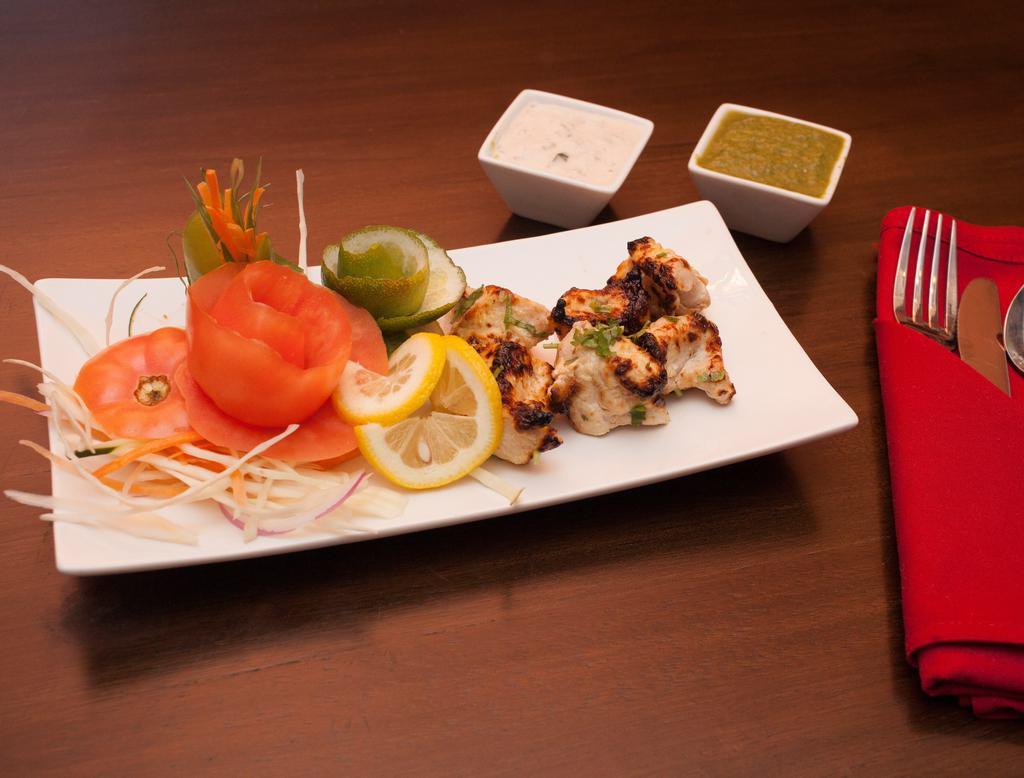 Chicken Malai Kabab · Marinated in cream cheese and ginger.