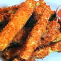 Zucchini Sticks · Sliced zucchini, breaded, and baked or fried. 