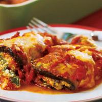 Eggplant Rollatini · 2 pieces. Eggplant rolled and baked with cheese. Baked with cheese. 