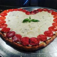Margherita Pizza · Fresh mozzarella, fresh basil and garlic, peeled plum tomatoes and pecorino Romano cheese.
