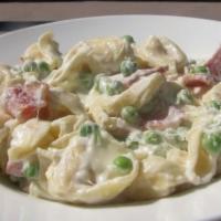 Tortellini Alfredo · Tortellini with rich butter and Parmesan sauce.