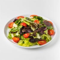 Green Salad · Fresh salad with a variety of green vegetables typically served on a bed of lettuce. 