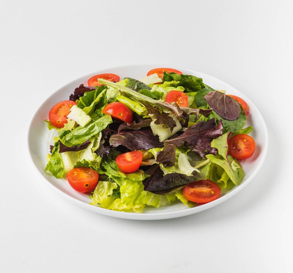 Green Salad · Fresh salad with a variety of green vegetables typically served on a bed of lettuce. 