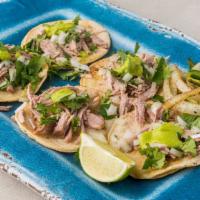 Grilled Chicken Tacos (5) · Grilled Chicken on a corn tortilla topped with onions and cilantro, limes and one side of sa...