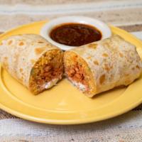 Grilled Chicken Burrito · Grilled Chicken on a flour tortilla, rice, refried beans, onions, cilantro, sour cream and o...