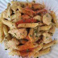 Cajun Chicken Pasta · All natural chicken breast swimming in a sauce loaded with Cajun seasonings pasta and pepper...