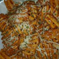 Garlic Fries · Vegetarian. Note: our fries and vegetables  are cooked in separate fryers and cookware from ...