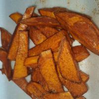 Sweet Potato Fries · Hand cut/crafted Sweet Potato fried and topped with our special seasonings