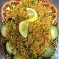 Boneless Chicken Biryani · Slow-cooked with aromatic basmati rice infused with saffron and whole with a finishing touch...