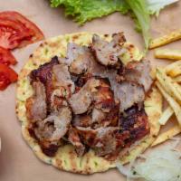 Lamb Gyro Pita Sandwich ·  Lamb cooked on a spit and wrapped in a pita. 
