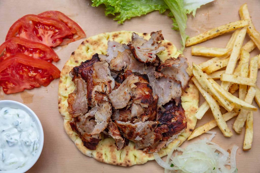 Doner Kebab Entree lamb gyro · Turkish gyro. Very thinly sliced grilled meat.