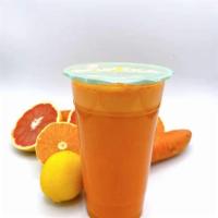 J10. Slimmer Trimmer · Served with Grapefruit, Orange, Lemon and Carrot.