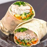 Spicy Thai Wrap · Grilled chicken, rice noodles, cucumbers, carrots and romaine hearts with sweet Thai chili d...