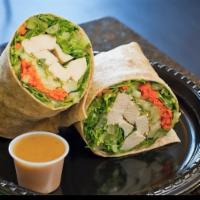 Grilled Sesame Chicken Wrap · Grilled all-natural chicken, cucumbers, carrots, toasted sesame seeds, alfalfa sprouts and r...