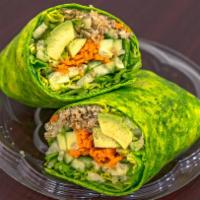 Avocado Veggie Wrap · Avocado, toasted sunflower seeds, cucumbers, carrots, quinoa and romaine hearts with ranch d...