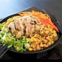 Southwest Pork Bowl · Healthy rice mix with braised pork, smoked jalapeno, romaine hearts, carrots, roasted corn a...