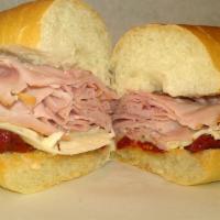 Toscana Sub · Tuscan ham, mozzarella, sun-dried tomatoes and Tuscan flavored oil. Served on an 8