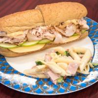 Marche Sub · Cajun turkey, smoked Gouda, sliced green apples and chipotle mayo with cranberries on whole ...