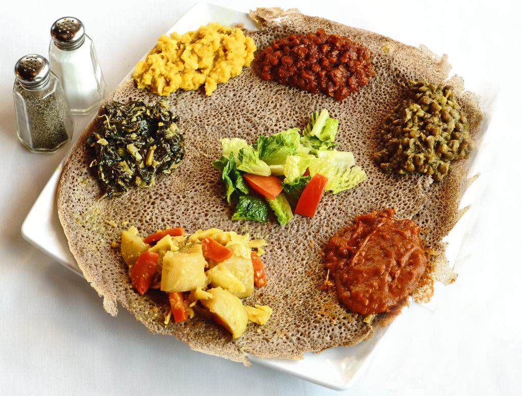 Fresh and Heartier Veggie Combo · Classy mixed Ethiopian vegetarian plate offers a bit of yemiser wot spicy and non spicy, Kik alicha, yatikelt wot, gomen and salad. Vegetarian.