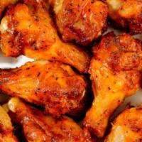 Chicken Wings  · Lightly breaded bone-in wings, served wits spicy wing souce or without.