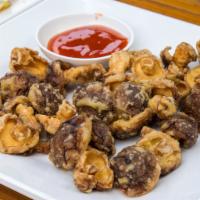Fried Mushrooms · Fresh mushrooms are hand breaded and deep fried.