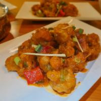 Gobi Manchurian · Crispy cauliflower florets tossed in a spicy, sweet and tangy manchurian sauce. Vegan, glute...