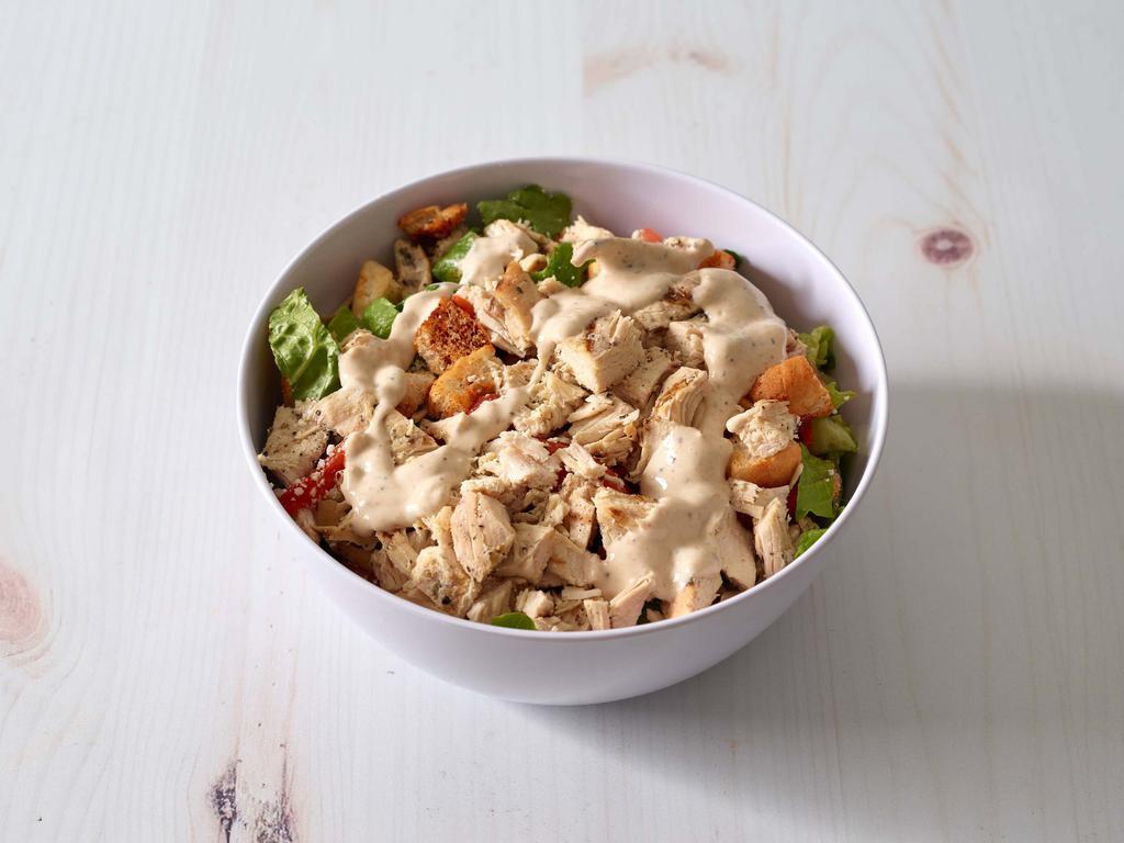 Chicken Caesar Salad  · Crisp romaine, roasted red peppers, cherry tomatoes, shaved Romano cheese and croutons. 