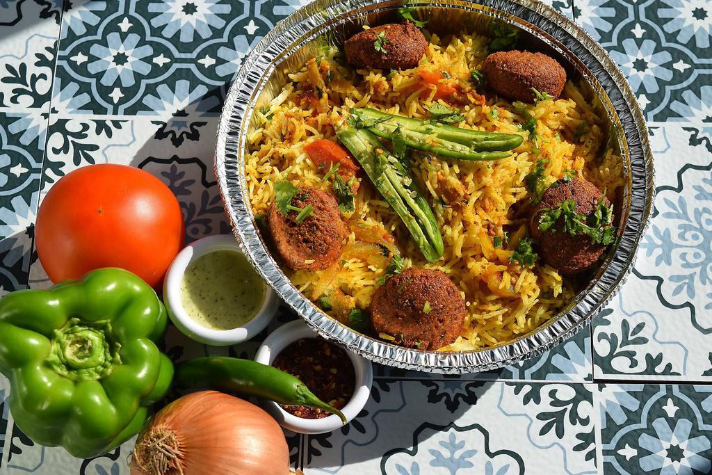 Falafel Biryani · Aromatic rice cooked with a blend of spices.