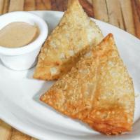 Samosa · Savory fried pastry filled with potatoes, peas, and spices. Vegetarian friendly. Vegan if ea...